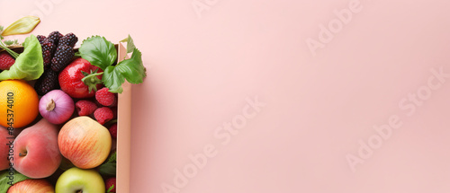 Fresh produce in paper bag on pastel pink. Healthy ingredients with space for text