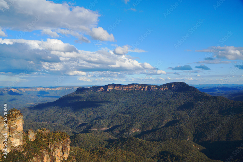 Landscape of The Three Sisters are an unusual rock formation in the Blue Mountains National Park of Katoomba , New South Wales, Australia, on the north escarpment of the Jamison Valley - Nature Track Landscape of The Three Sisters are an unusual rock formation in the Blue Mountains National Park of Katoomba , New South Wales, Australia, on the north escarpment of the Jamison Valley - Nature Track