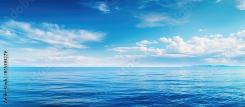 Blue seascape shiny blue sea horizon blue sky. Creative banner. Copyspace image