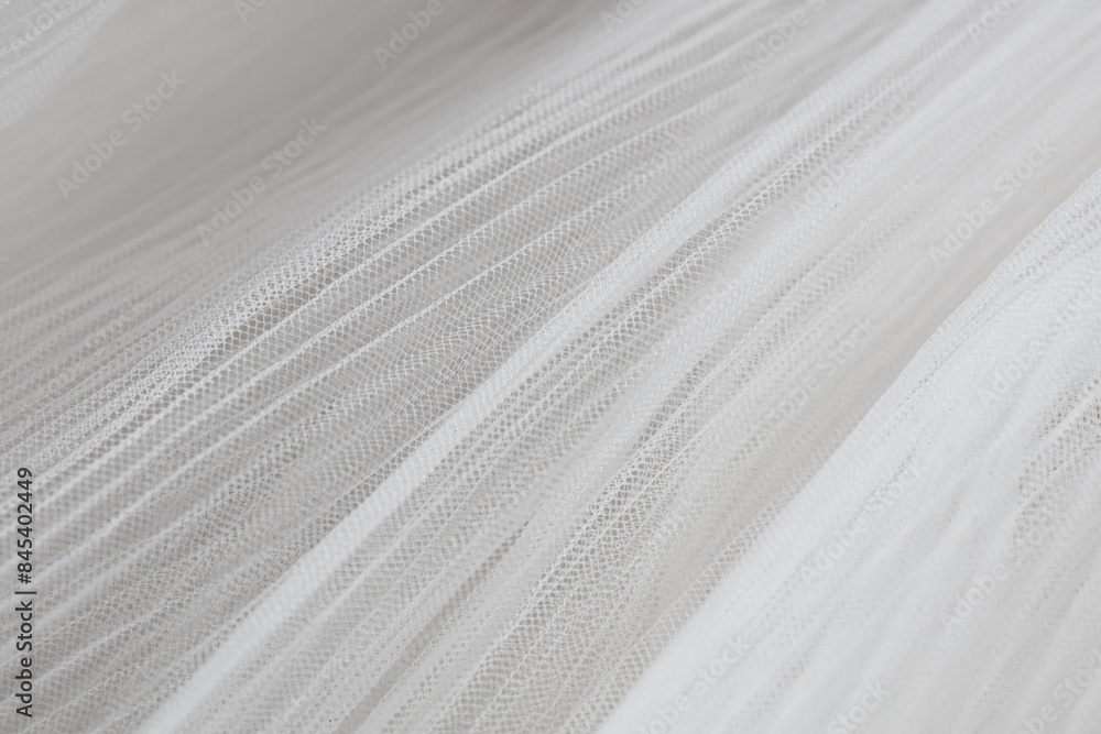 closeup of white corrugated organza textured background closeup of white corrugated organza textured background