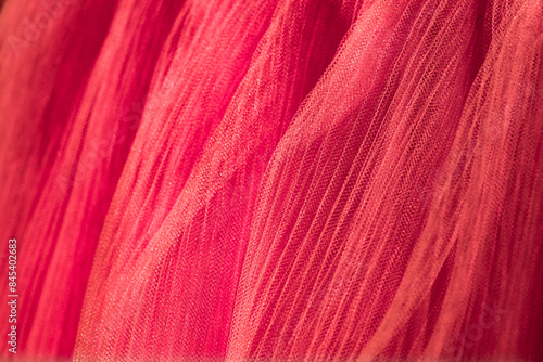 closeup of orange corrugated organza textured background