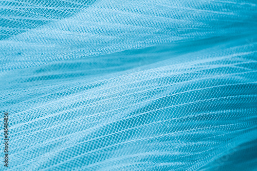 closeup of blue corrugated organza textured background