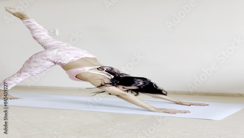 Video Of A Fitness Trainer doing Padahastasana.
