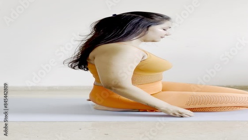 An Indian Pretty Woman Performs The Vajrasana Pose In This Video.
