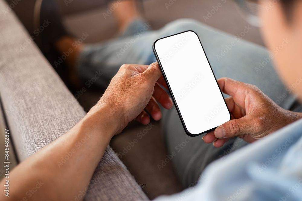 cell phone blank white screen mockup.hand holding texting using mobile on desk at office.background empty space for advertise.work people contact marketing business,technology cell phone blank white screen mockup.hand holding texting using mobile on desk at office.background empty space for advertise.work people contact marketing business,technology