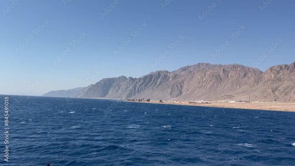 Landscape of the Red Sea with mountains in the city of Dahab - Sharm El Sheikh - Sinai in Egypt Landscape of the Red Sea with mountains in the city of Dahab - Sharm El Sheikh - Sinai in Egypt