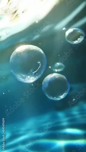 Wallpaper Mural clean blue underwater view with bubbles and light - 4k 9x16 new stock video footage animation AI Torontodigital.ca