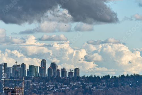 Surrey downtown view on cloudy sky background photo