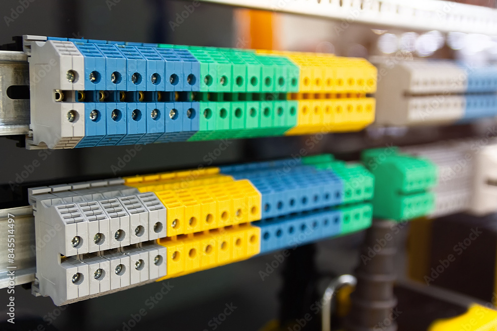 New terminal blocks located on a DIN rail at the exhibition stand New terminal blocks located on a DIN rail at the exhibition stand