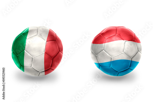 football balls with national flags of luxembourg and italy ,soccer teams. on the white background.