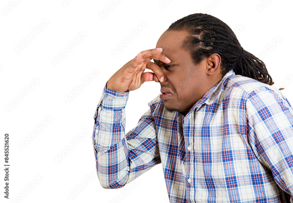 Closeup portrait young funny man, disgust on face pinches his nose something stinks, bad smell situation, isolated white background. Closeup portrait young funny man, disgust on face pinches his nose something stinks, bad smell situation, isolated white background.