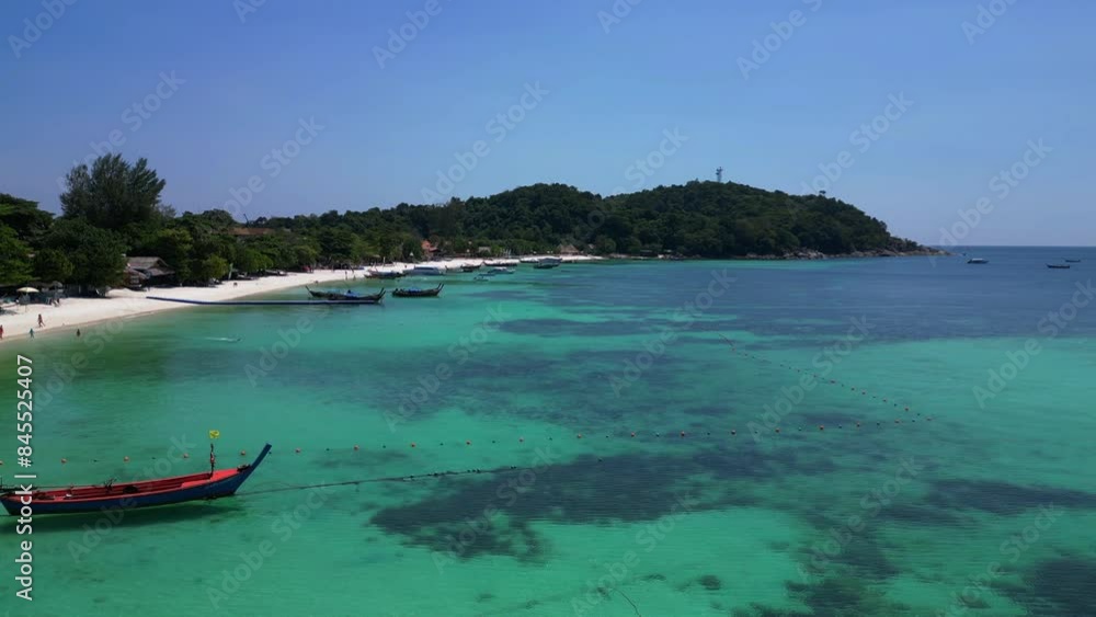 Relaxing on sandy beach with longtail boats. Majestic aerial view flight drone Relaxing on sandy beach with longtail boats. Majestic aerial view flight drone