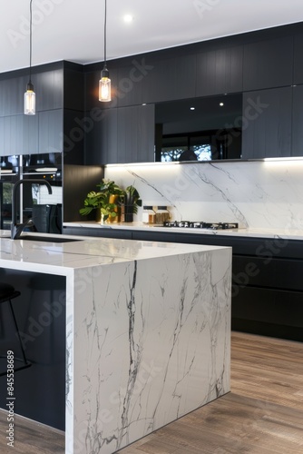Wallpaper Mural Luxurious kitchen interior with black cabinetry and marble island. Torontodigital.ca