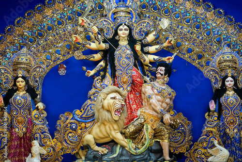 Devi maa Durga idol with her family in West Bengal, India. Hindu festival Navratri was celebrating. It is also called Durga puja, the biggest festival for Bengali celebrated globally.
