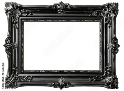 A black, intricately designed picture frame against a white background, showcasing elegant and classic decor