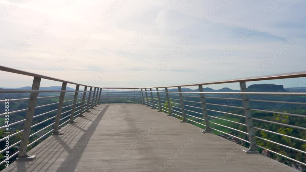 Spectacular views from modern new observation deck on sandstone cliffs. Bastei Bridge in Saxon Switzerland National Park. Germany Spectacular views from modern new observation deck on sandstone cliffs. Bastei Bridge in Saxon Switzerland National Park. Germany