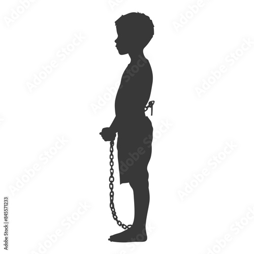 Silhouetted Boy in Chains: Historical Symbol of Child Slavery and Lost Freedom.