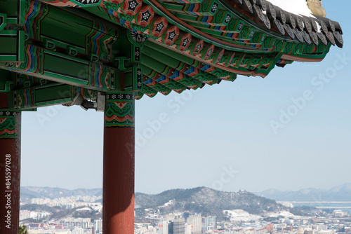 View of the traditional Korean pavilion on the mountain in winter photo