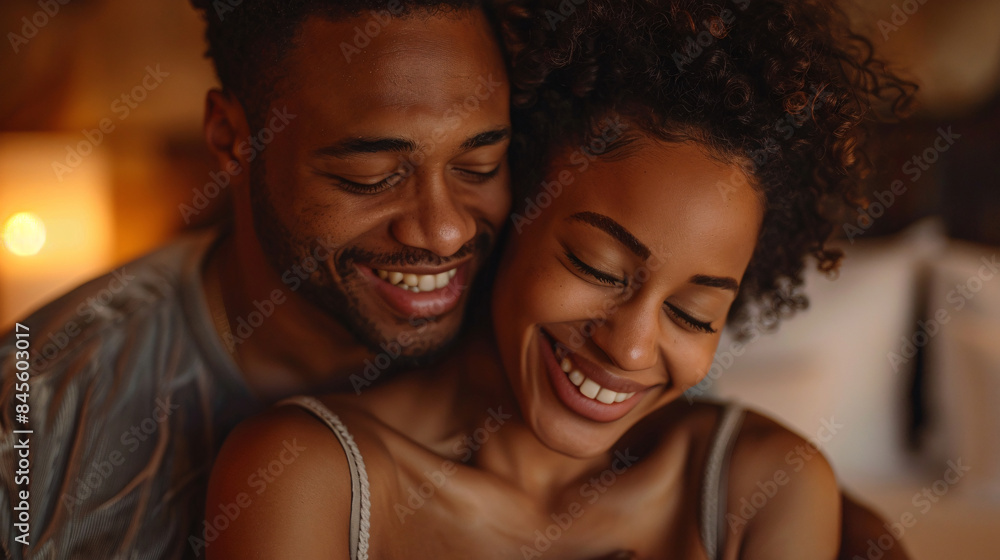 Couple embracing and smiling in a luxurious hotel suite Couple embracing and smiling in a luxurious hotel suite