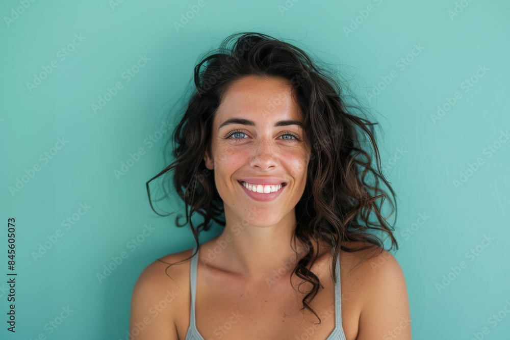 A close up portrait of a woman with a subtle smile A close up portrait of a woman with a subtle smile