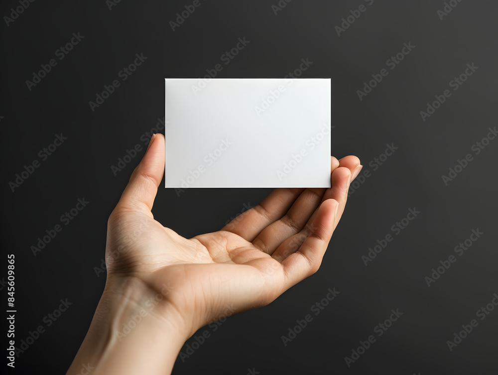 Hand-holding blank business card mockup Hand-holding blank business card mockup