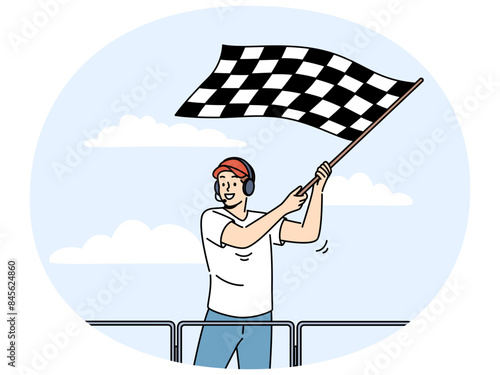 Smiling man in headset waving checkered flag at race on stadium. Happy male employee announce finish of auto racing with flag. Sport competition. Vector illustration.