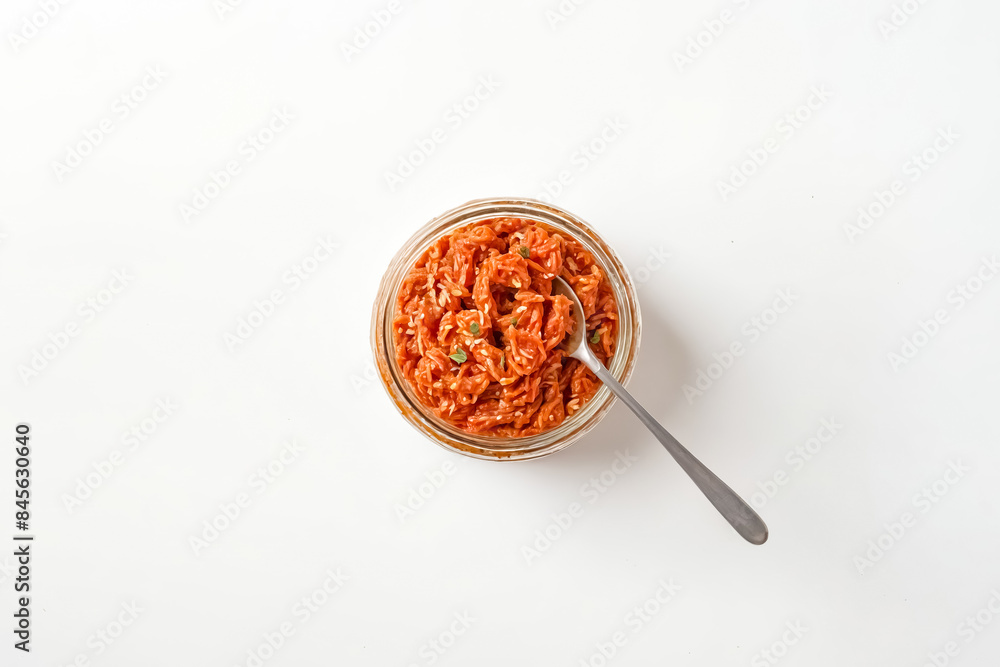 Korean Kimchi in a Glass Jar with Spoon Korean Kimchi in a Glass Jar with Spoon