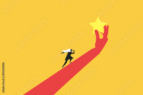 Businesswoman run up to reach star in giant hand. concept of Employee success recognition, encourage and motivate best performance, cheering or honor on success or achievement