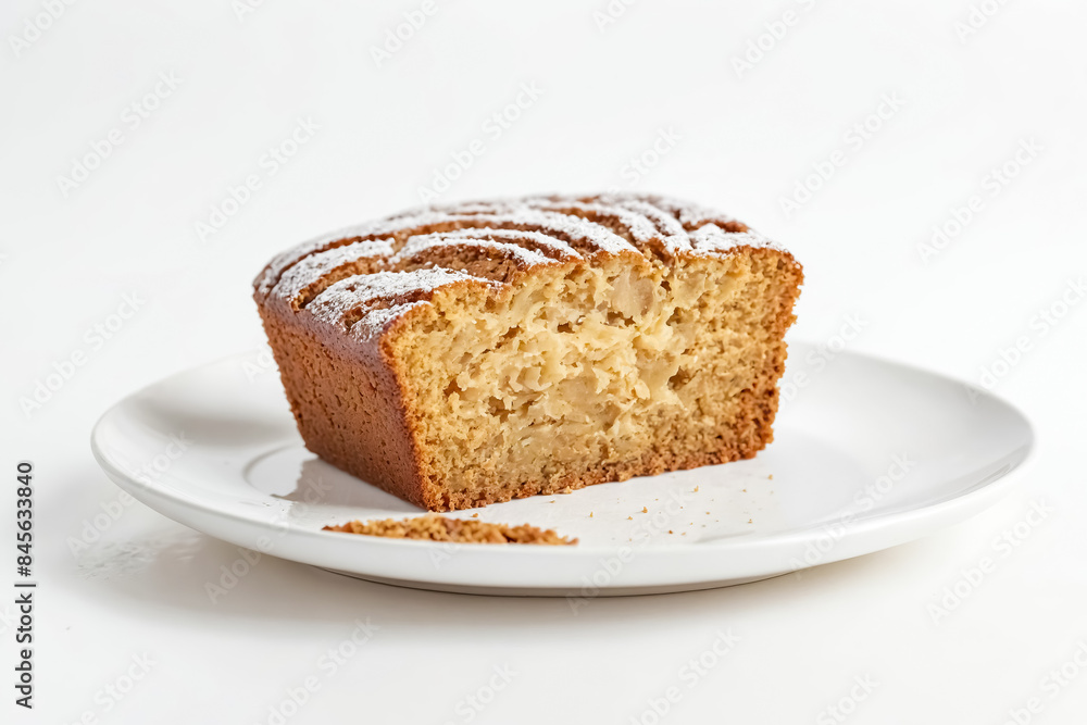 Close-up of a Sliced Apple Cake on a White Plate Close-up of a Sliced Apple Cake on a White Plate