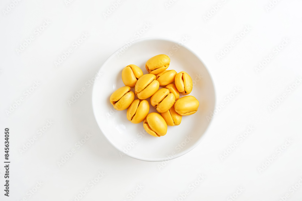 Fototapeta premium Yellow Fruit in White Bowl