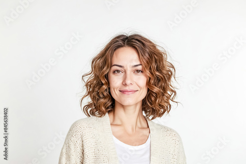 Portrait of a smiling woman with curly hair © Rysak