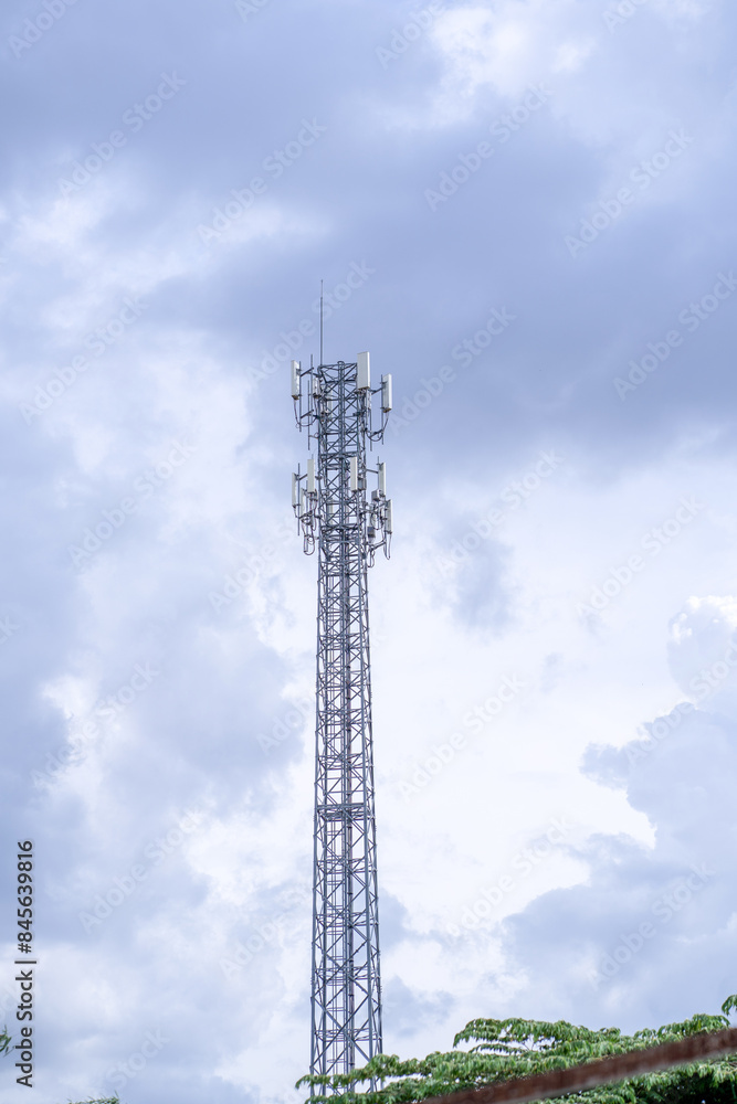 Signal tower or Mobile phone tower .Global connection and internet network concept.on blue sky. Signal tower or Mobile phone tower .Global connection and internet network concept.on blue sky.
