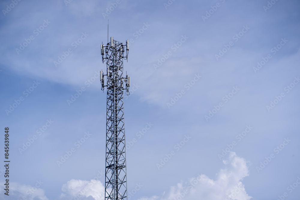 Signal tower or Mobile phone tower .Global connection and internet network concept.on blue sky. Signal tower or Mobile phone tower .Global connection and internet network concept.on blue sky.