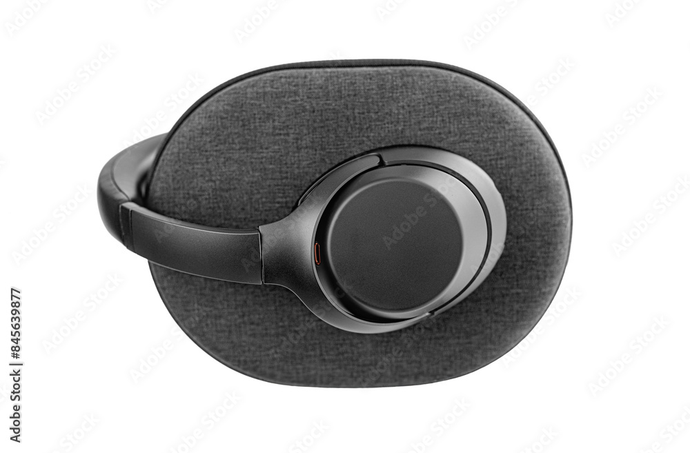 Black wireless headphones isolated on white background.