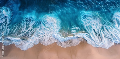 Aerial View of Turquoise Water Breaking on Sandy Beach