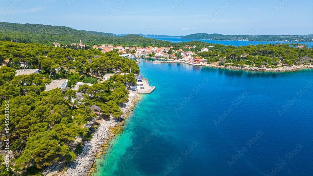 Božava (Bozava) is a charming village located on Dugi Otok, Croatia, perfect for a serene summer getaway captured by drone Božava (Bozava) is a charming village located on Dugi Otok, Croatia, perfect for a serene summer getaway captured by drone