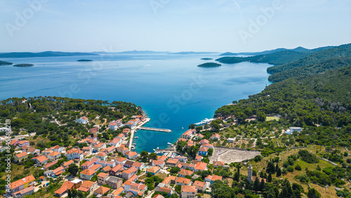 Božava (Bozava) is a charming village located on Dugi Otok, Croatia, perfect for a serene summer getaway captured by drone photo