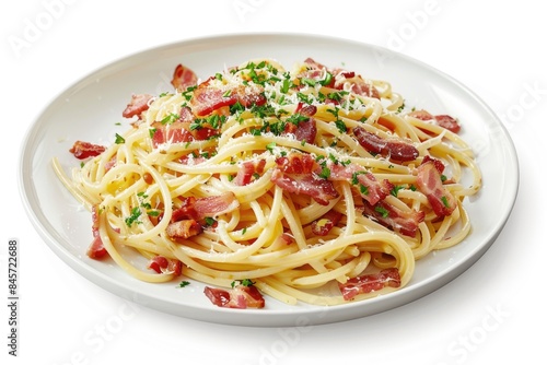 Plate of spaghetti with crispy bacon and fresh chives, great for food photography or recipe inspiration