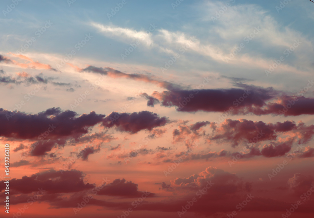 Pink and grey clouds during sunset Pink and grey clouds during sunset
