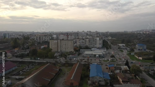 Wallpaper Mural Khmelnytskyi, Ukraine - 14.03.2022: Small gray old city town 4k aerial view top in autumn. Ukraine building house. Abandoned factory with many ruined buildings. Old brick thick pipe on empty plant Torontodigital.ca