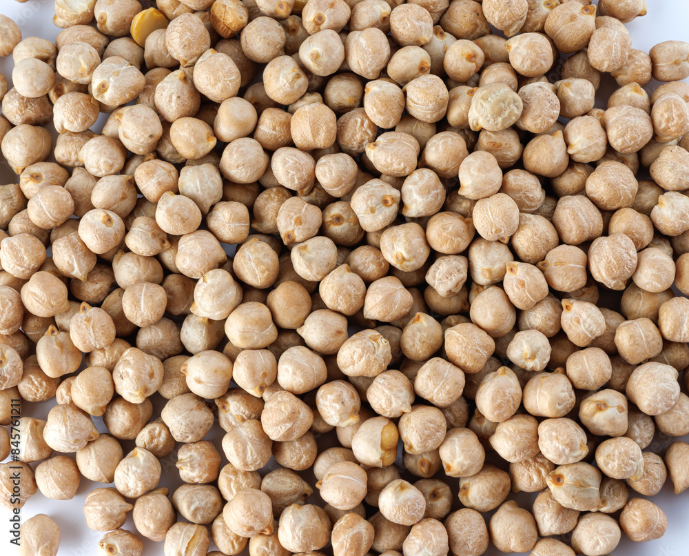 Chickpea background. The chickpeas are poured in an even layer. Chickpea background. The chickpeas are poured in an even layer.