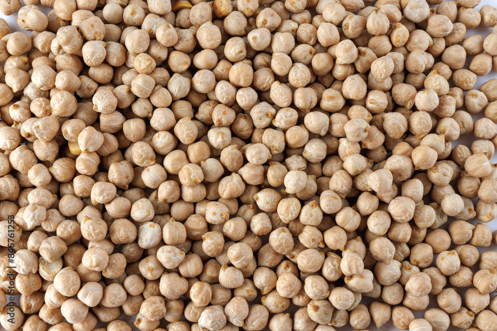 Chickpea background. The chickpeas are poured in an even layer. Chickpea background. The chickpeas are poured in an even layer.