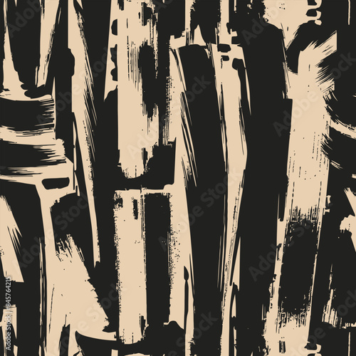 Abstract black and beige brushstroke seamless pattern forming an artistic background design