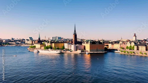 Stockholm, Sweden. Lake Malaren. View to Riddarholmen island with towers and beautiful buildings. Famous landmarks of Sweden. Stockholms Panorama at summer day. Tourism destinations sightseeing. 