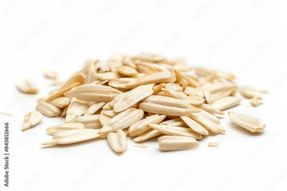 Close up of sunflower seeds without shell on white background Close up of sunflower seeds without shell on white background