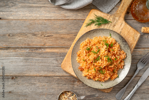 Obraz na płótnie Rice with minced beef in tomato sauce in a plate. Top view from the copyspace w salonie