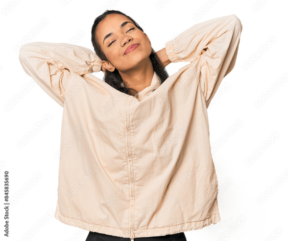 Young Filipina woman feeling confident, with hands behind the head. Young Filipina woman feeling confident, with hands behind the head.