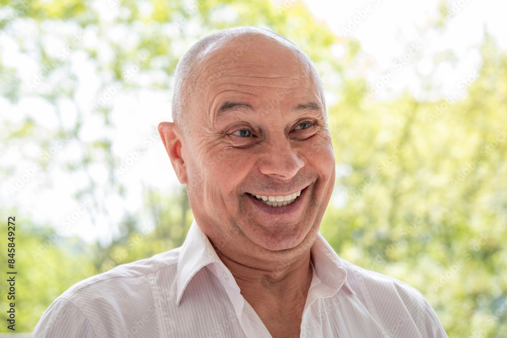 close-up charismatic happy senior, pensive man 65 years old smiles joyfully, age-related skin changes, embracing life's simple pleasures close-up charismatic happy senior, pensive man 65 years old smiles joyfully, age-related skin changes, embracing life's simple pleasures