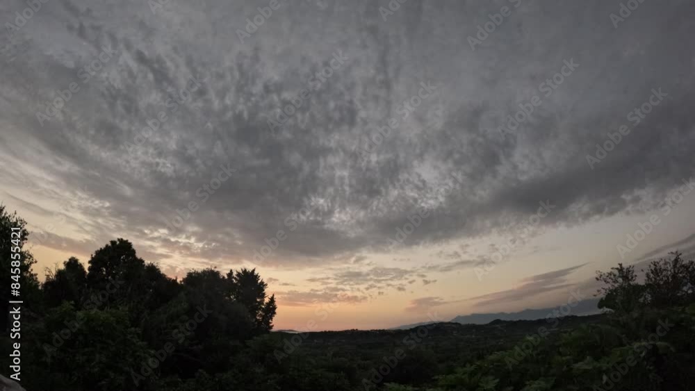 4K Time lapse of Majestic sunset or sunrise landscape Amazing light of nature cloudscape sky and Clouds moving away rolling colorful dark sunset clouds Footage timelapse.Nature environment background 4K Time lapse of Majestic sunset or sunrise landscape Amazing light of nature cloudscape sky and Clouds moving away rolling colorful dark sunset clouds Footage timelapse.Nature environment background
