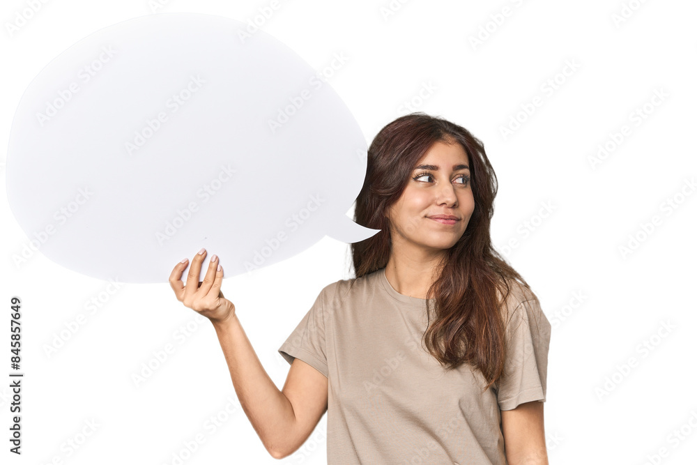 Middle Eastern woman holding comic bubble dreaming of achieving goals and purposes Middle Eastern woman holding comic bubble dreaming of achieving goals and purposes